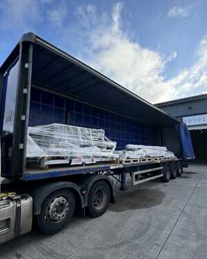 factory equipment safely stored on lorry ready for removal